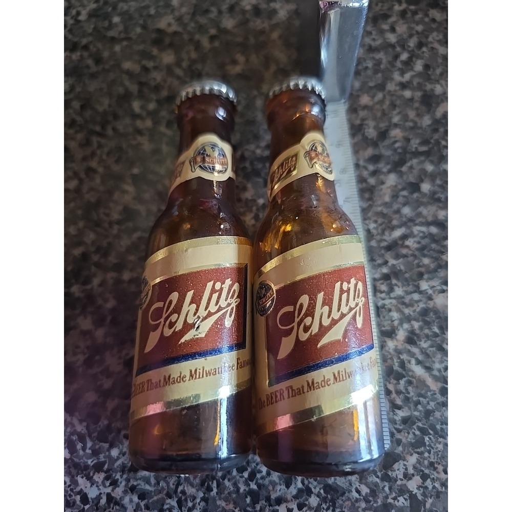 vintage Schlitz beer bottles. Schlitz is a historic American beer brand,...